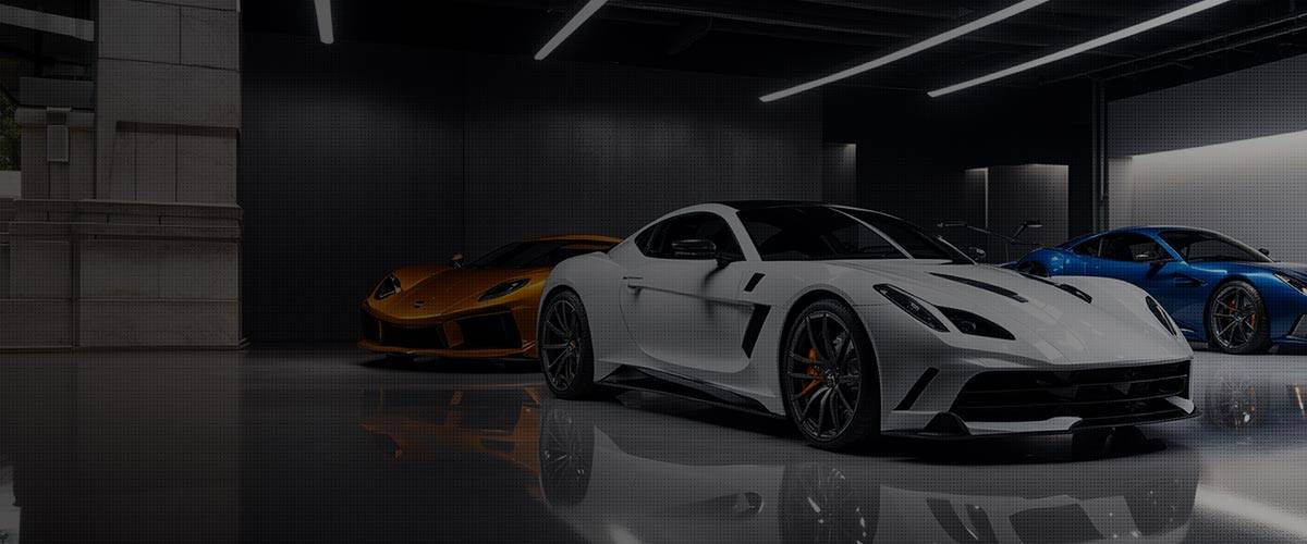 A group of exotic cars in a show room awaiting appraisal